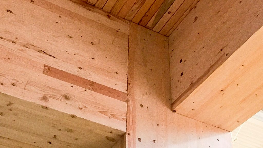 The original building plan for Toronto’s 80 Atlantic Avenue called for cross-laminated timber but nail-laminated timber (NLT) was selected for cost and esthetic reasons. NLT consists of lumber stood on edge, sandwiched together with nails to form panels.