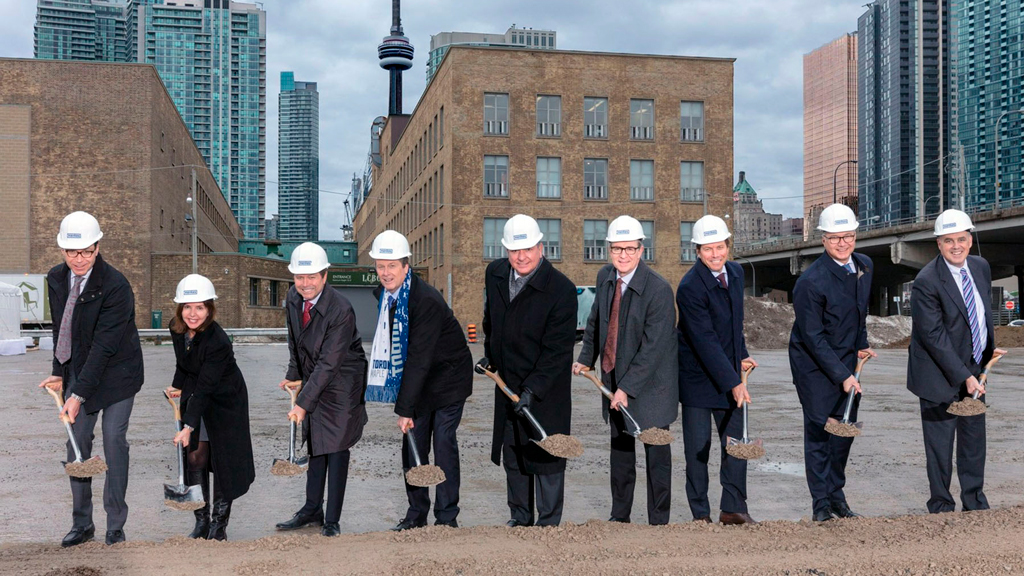 Stakeholders and officials recently attended the Sugar Wharf groundbreaking. From left to right: Menkes president low-rise residential division Steven Menkes; Ward 28 councillor Lucy Troisi; Menkes president highrise residential division Alan Menkes; Toronto Mayor John Tory; Ontario Finance Minister Charles Sousa; LCBO president and CEO George Soleas; Menkes president, commercial/industrial division Peter Menkes; Greystone Managed Investments managing director and CIO Ted Welter; and Triovest CEO Vince Brown.