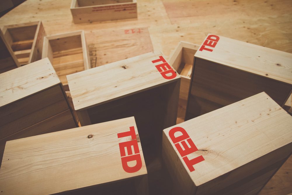 In 2014, 23 architecture and interior design students spent eight weeks designing and building the TED Community Theatre Stage. Using donated wood from B.C. forests, they built 400 planter boxes that were then assembled as building blocks for the stage and backdrop.