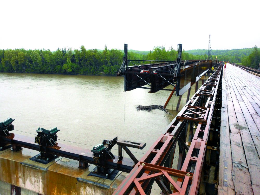 Completed last fall, the Fort Nelson River Bridge has a superstructure founded on three rows of steel girders. Its piers and abutments were also updated with modern-day design specifications.