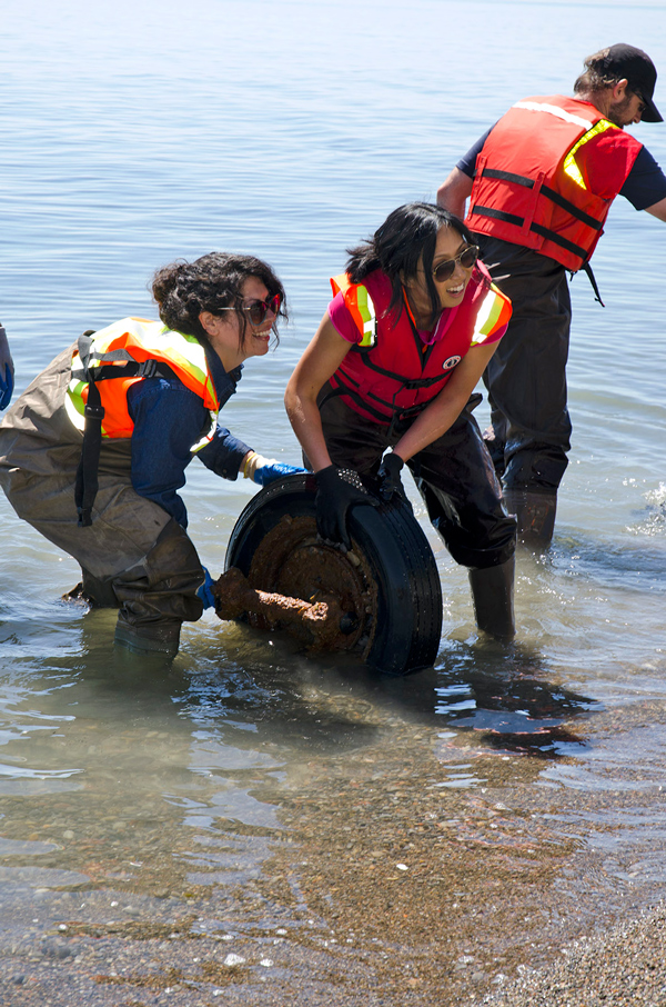 Volunteers pulled out many different objects from the water and sand during the shoreline cleanup at East Point Park in Scarborough, Ont. Much of the cleanup included removing car parts which had been dumped in the area.