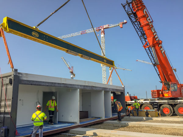 PCL Agile constructed a modular office complex on the site of the Mackenzie Vaughan Hospital project using recycled sea containers. Fabrication took three months and the facility took three days to erect.