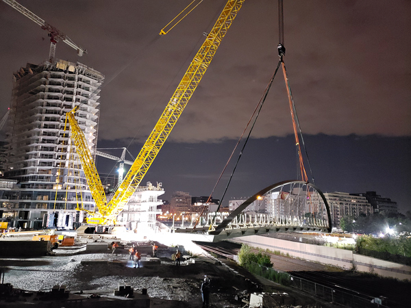 The bridge was supplied by Mariani Metal Fabricators and was lifted into place by one of the largest crawler cranes in North America, supplied by Sterling Crane Canada. 