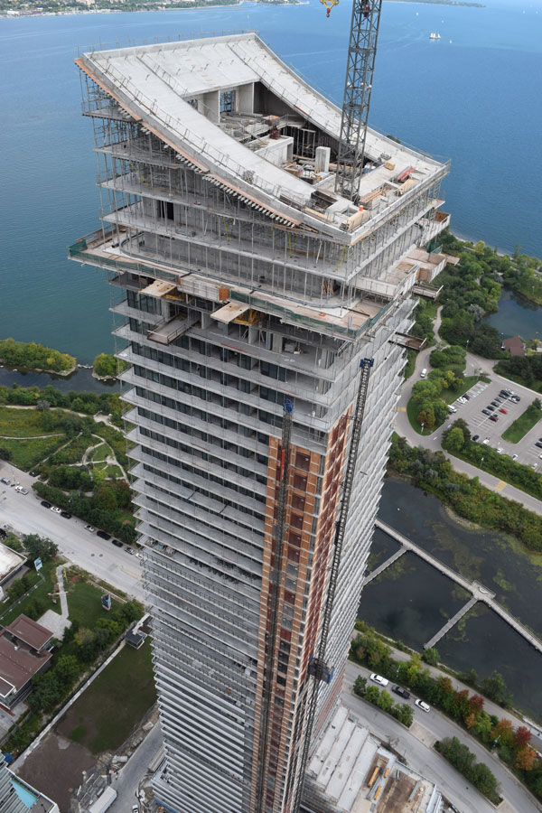 The two towers at the Eau du Soleil project on Lake Shore Boulevard West in Toronto are 67 and 50 floors tall and named the Sky and Water towers respectively. Pictured is the Water tower.
