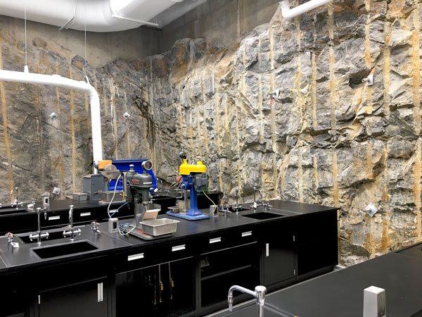 The new engineering and innovation building at the Laurentian University campus in Sudbury, Ont. features an almost two-storey-high exposed rock wall, which was created by drilling into rock and then blasting, giving the building a unique natural feature.