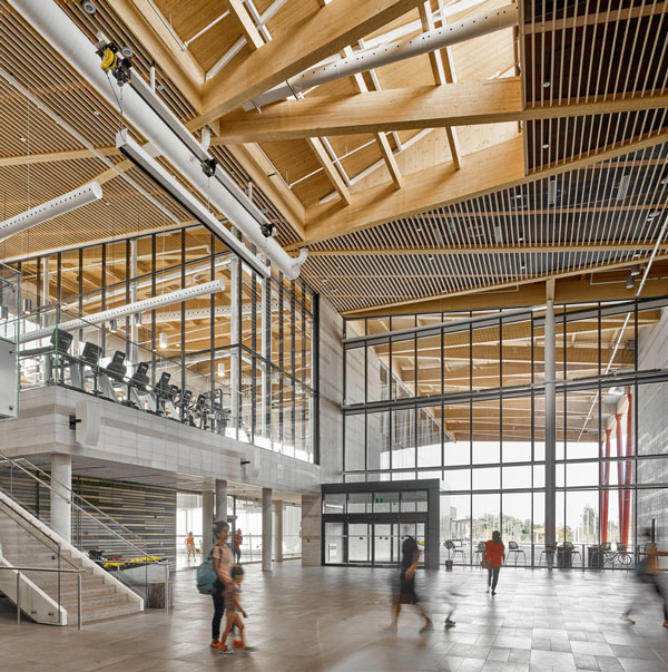 The roof system at the Aaniin Community Centre and Library in Markham, Ont. is comprised of glulam primary beams, glulam purlins and spruce-pine-fir decking. The project won an Institutional Wood Design Award.