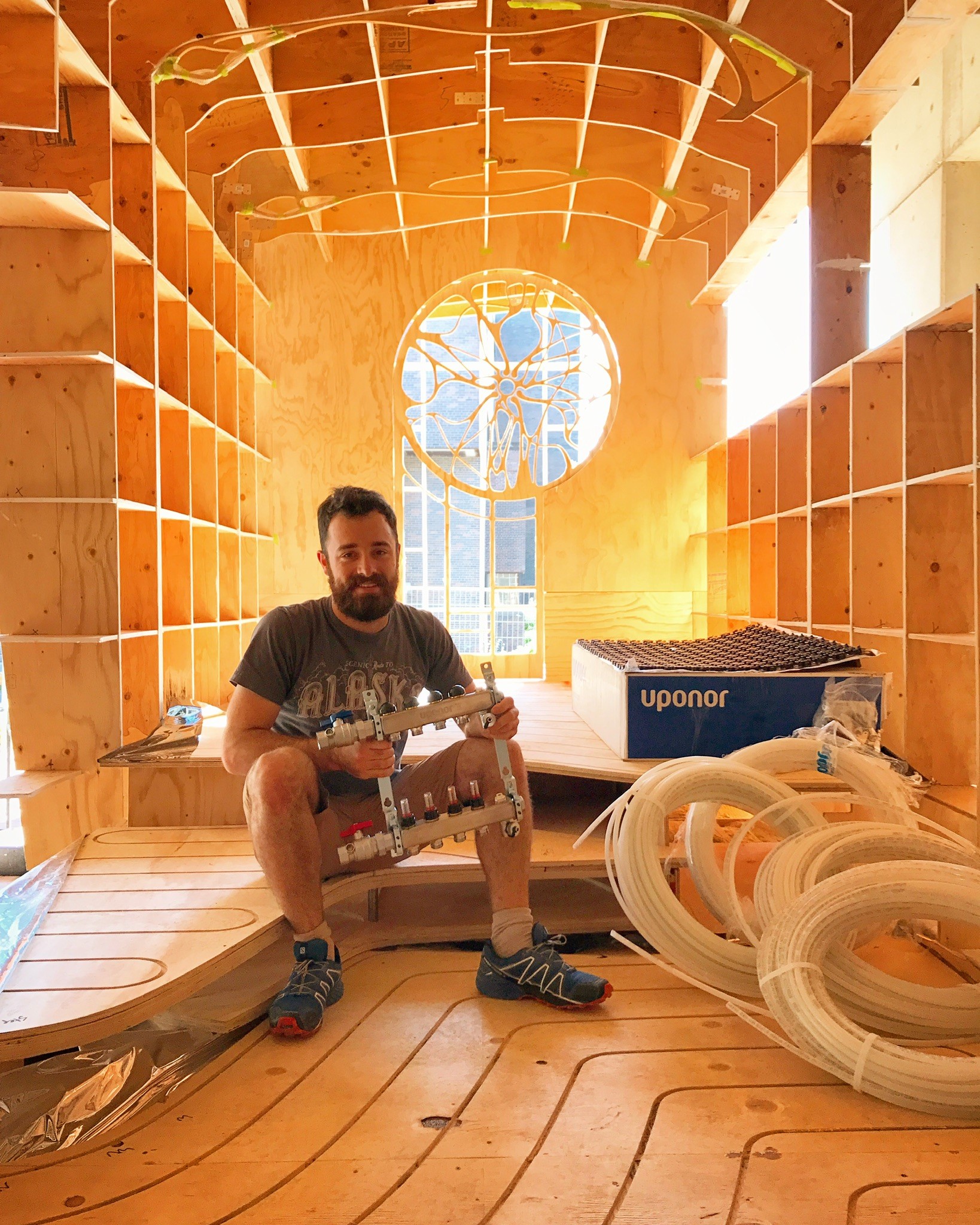 The interior of Ben Hayward’s tiny home is designed in clean lines that give a visual impression of a larger space than the structure’s actual size of 180 square feet.