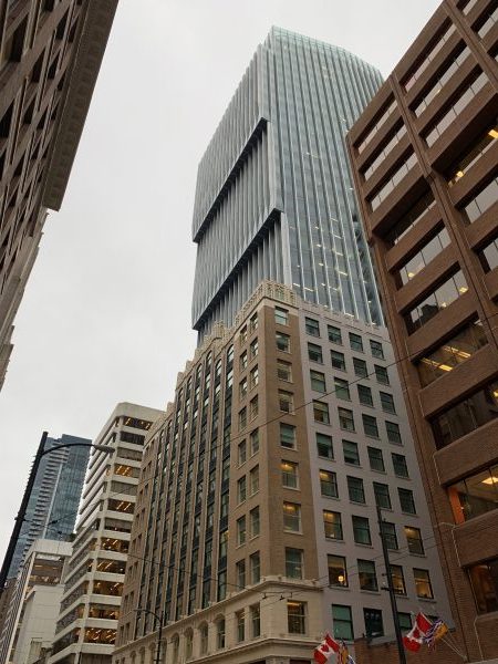 The 31-storey Exchange tower has preserved the facade of the original Vancouver Stock Exchange building and integrated it into the newer structure.