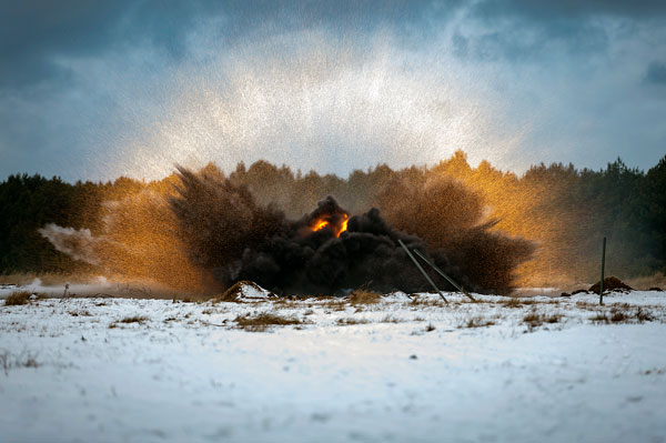 Bangalore torpedo demolition charges detonate at a demolition range in the Drawsko Pomorskie Training Area of Poland during Operation Reassurance on Jan. 12, 2017. These demolition charges take careful planning for Canadian combat engineers.