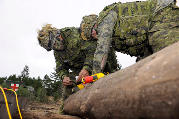 Sappers from 2 Combat Engineer Regiment prepare demolition charges during exercise Skilled Sapper at CFB Petawawa on October 24, 2012.