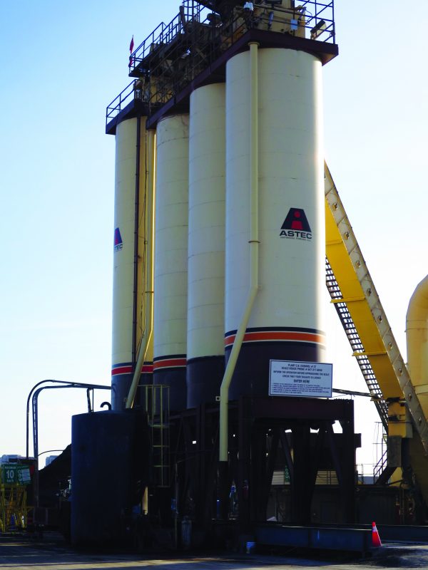 Pictured here is a Fermar Paving Limited asphalt plant. The company has embraced technology in order to improve safety at its work sites. For example, it uses sensors to prevent overtopping and spillage of asphalt cement as it is being pumped into plant silos.