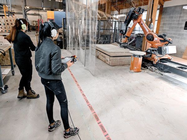 An eight-axis industrial robot was used to fabricate components of the Wander Wood installation at the university.