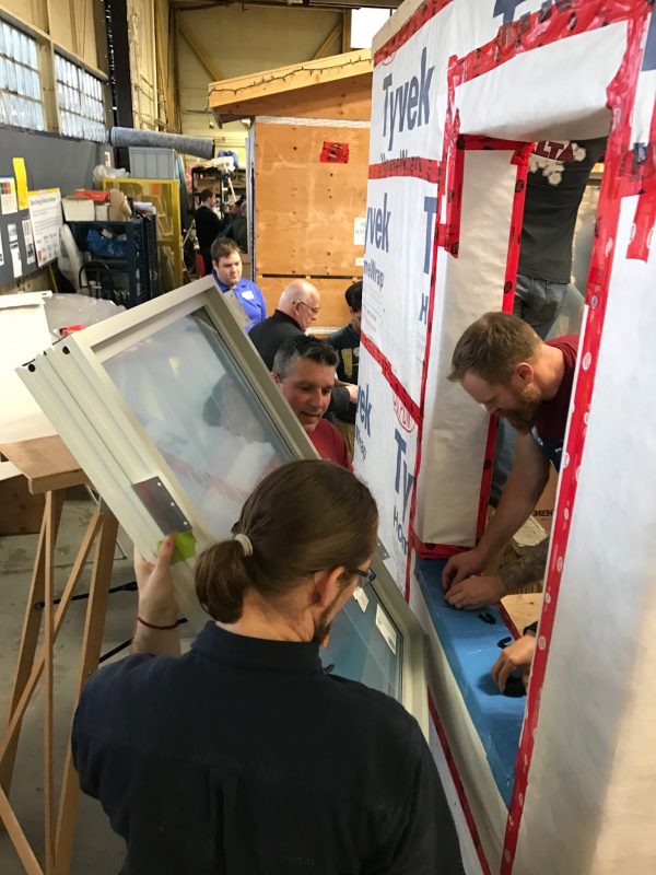 Students learn how to install windows at the British Columbia Institute of Technology’s High Performance Building Lab. The school is offering training to tradespeople as the province slowly implements the BC Energy Step Code, a policy shift towards net-zero-ready buildings.