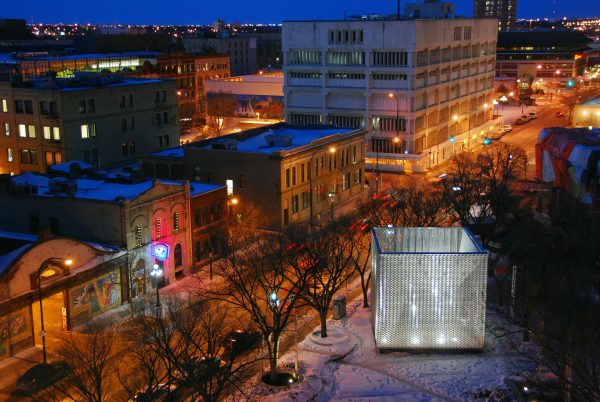 5468976 Architecture is well known for the Old Market Square Stage, located in Winnipeg's historic West Exchange District. “The Cube,” as the open-air venue is known, is a performance space and an interactive pavilion.