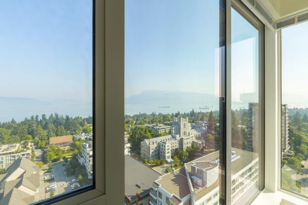 Boats and mountains are seen in the distance from a view high in Brock Commons, a residence at the University of British Columbia’s Vancouver campus. The school recently examined all of its buildings to assess their seismic needs and plan upgrades.