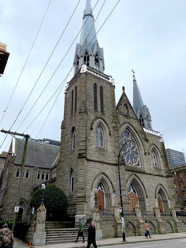 The Holy Rosary Cathedral in downtown Vancouver may see a new neighbour in an 18-storey tower built behind the church on the site where an existing rectory and youth activity centre stand.