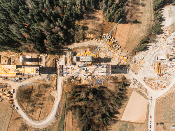 The use of drones for roadbuilding project sites has picked up considerably, say experts. Drones can provide engineers with overviews of projects like this image captured by a drone of a bridge and highway project site.