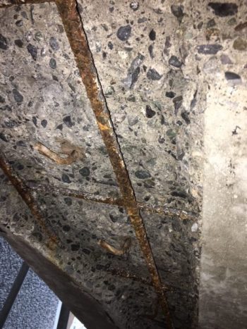 The underside of this staircase had started to spall due to corrosion of the rebar inside. This photo was taken after the spalled material had been chipped off to expose all the corroded rebar inside, notes Sudip Talukdar.