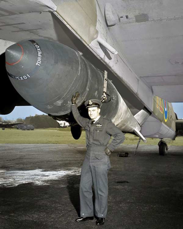 Pictured here is Canadian pilot John Fauquier alongside an actual Grand Slam bomb.
