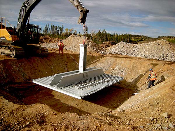 Crews worked to install a tower foundation in Saguenay, Que. in 2017 as part of the Chamouchouane–Bout-de-l’Ile project. A transmission tower foundation weighs nearly five tonnes and supports a vertical load of nearly 250 tonnes.