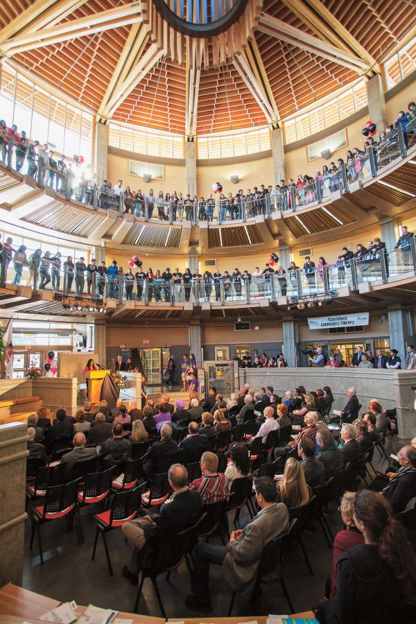 The striking entrance rotunda made of wood connects the old and new portions of the building and creates a detailed, focal element for the space.