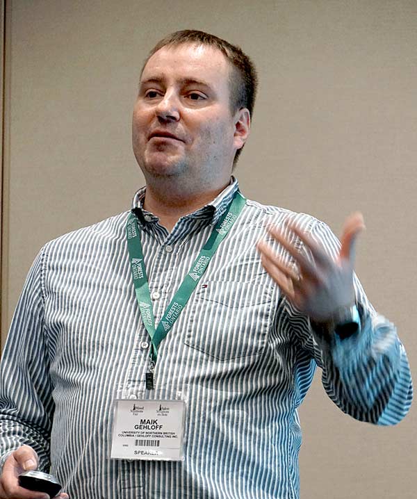 Maik Gehloff, senior lab instructor at the University of Northern British Columbia, speaks to attendees of the Wood Solutions Fair at The International Centre in Mississauga, Ont. about the current, and potential future, landscape of prefabrication technology.