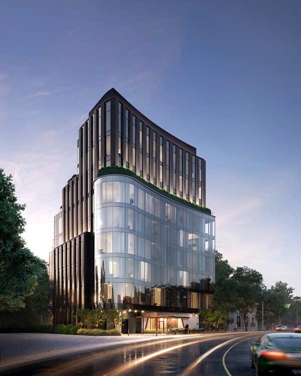 The glass facade of the 321 Davenport project in Toronto has a curvilinear design to fit into the curve of the street, the developer Alterra says.