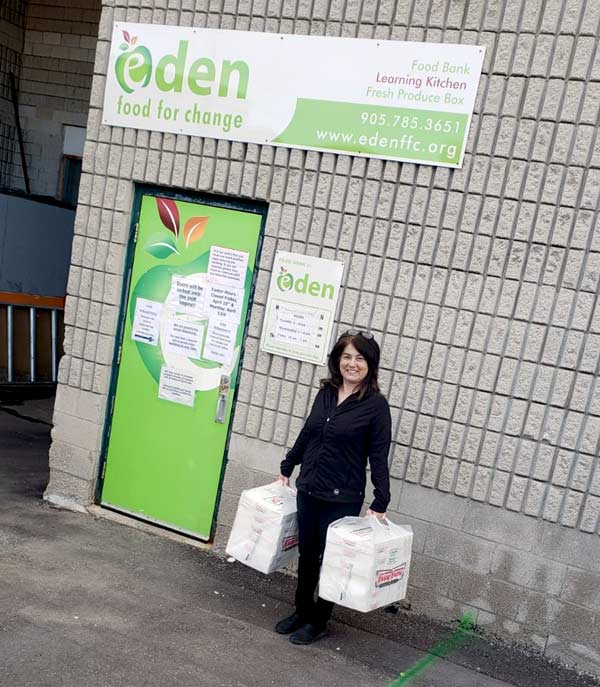 A food bank staff member in Mississauga received a batch of meals delivered for volunteers in appreciation of their efforts during the pandemic as part of a charitable effort organized by Build It by Design of Mississauga.