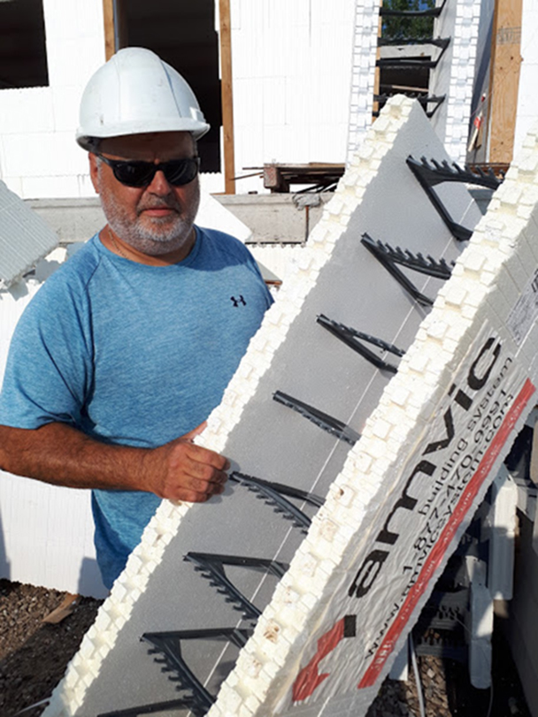 Jim Liovas, of Liovas Homes in Leamington, Ont., shows off the innovative Amvic insulated concrete form block system that is being used on a $20-million, 16-building development on Leamington’s east side that will eventually house as many as 600 migrant workers who work for Highline Mushrooms.