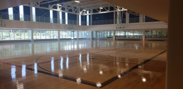 A running track overlooks the hardwood gymnasium floor at the new Oakville Trafalgar Community Centre.